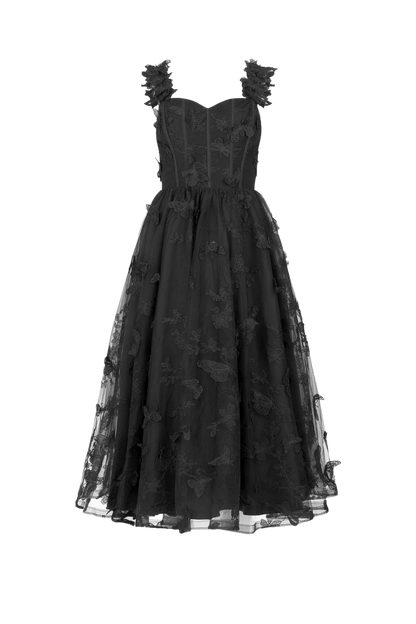 chic size inclusive model wearing JessaKae Mariposa Dress