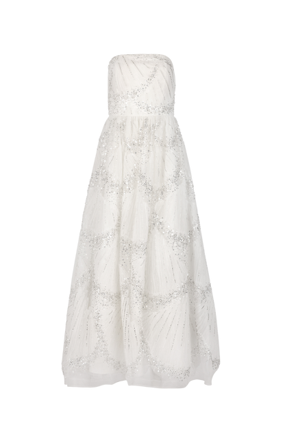 White strapless dress with silver embellishments on a fitted bodice and full skirt.