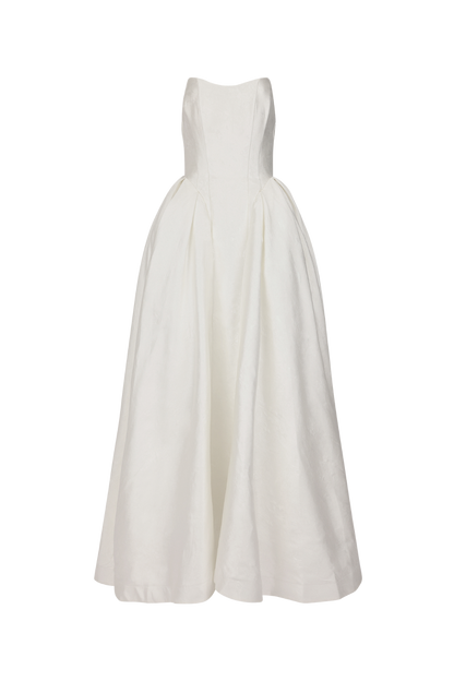 A white, sleeveless, knee-length dress with a fitted bodice and full skirt.
