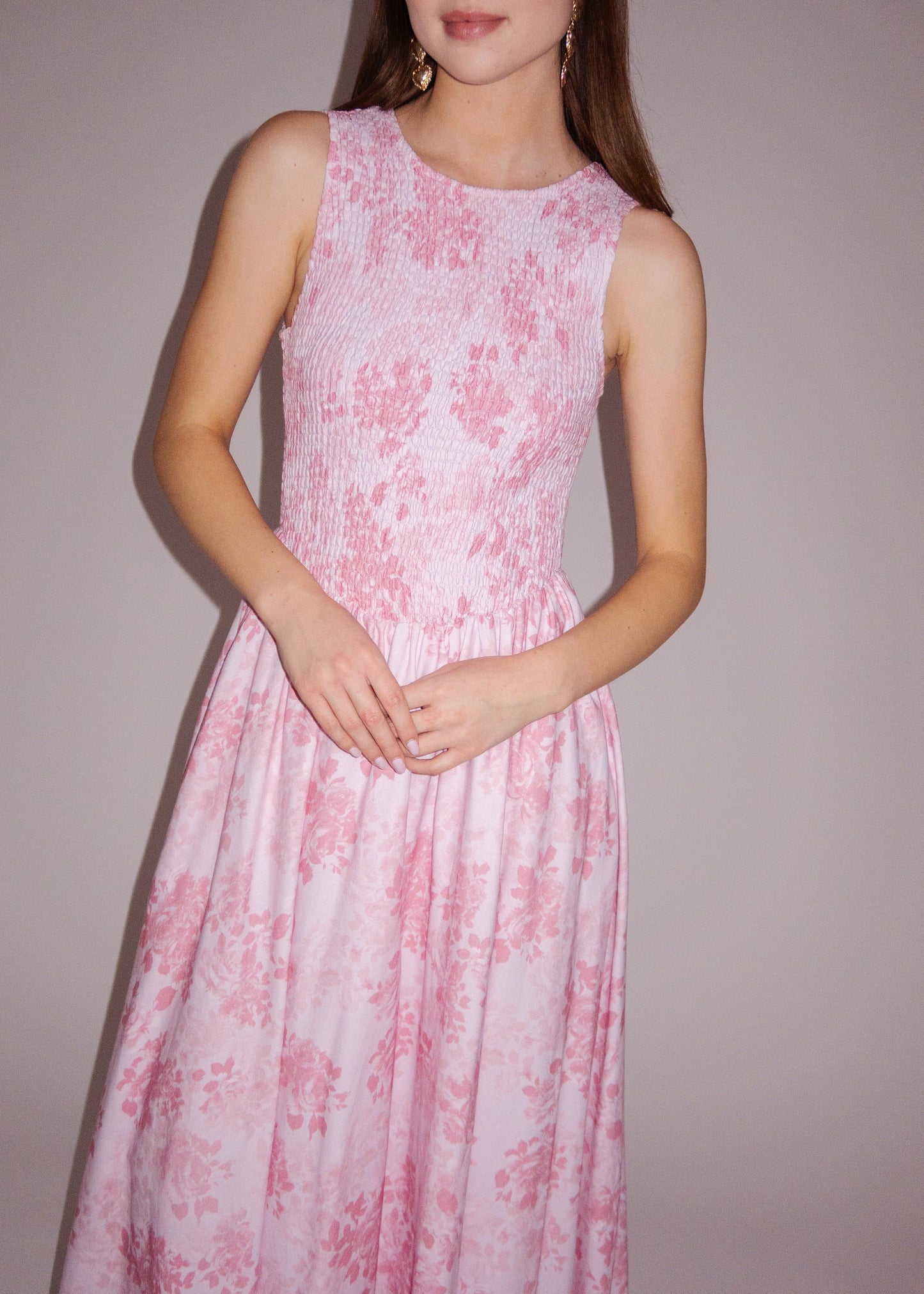 chic size inclusive model wearing JessaKae Camille Smocked Floral Maxi Dress - Pink