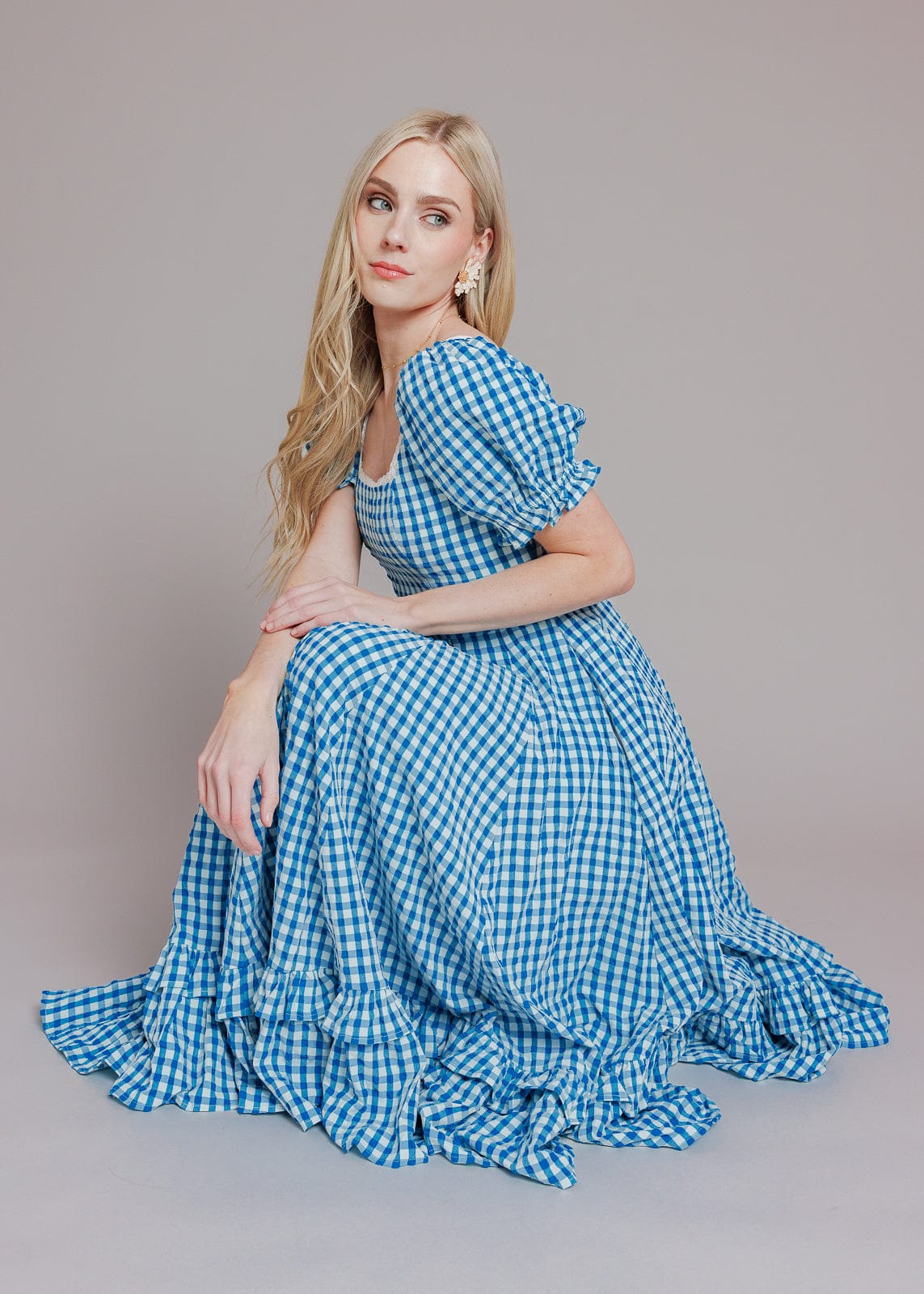 chic size inclusive model wearing JessaKae Dorothy Dress Dresses
