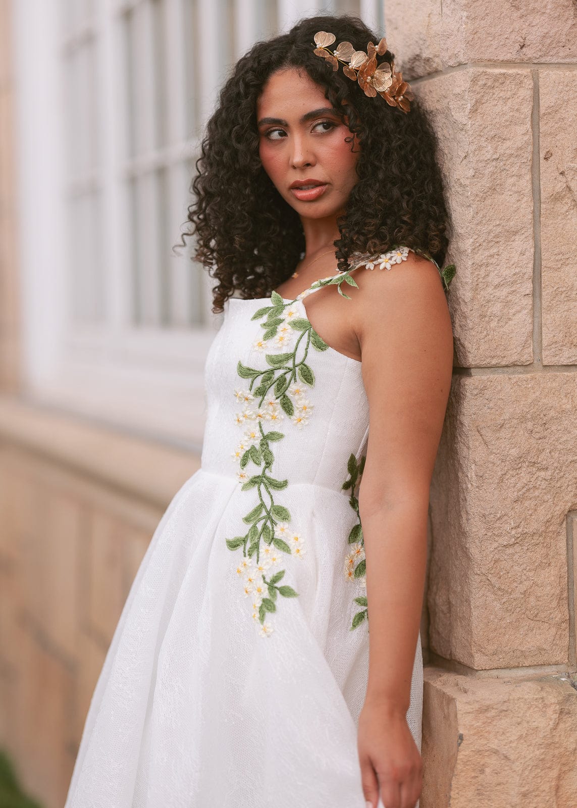chic size inclusive model wearing JessaKae Lily Petal Dress