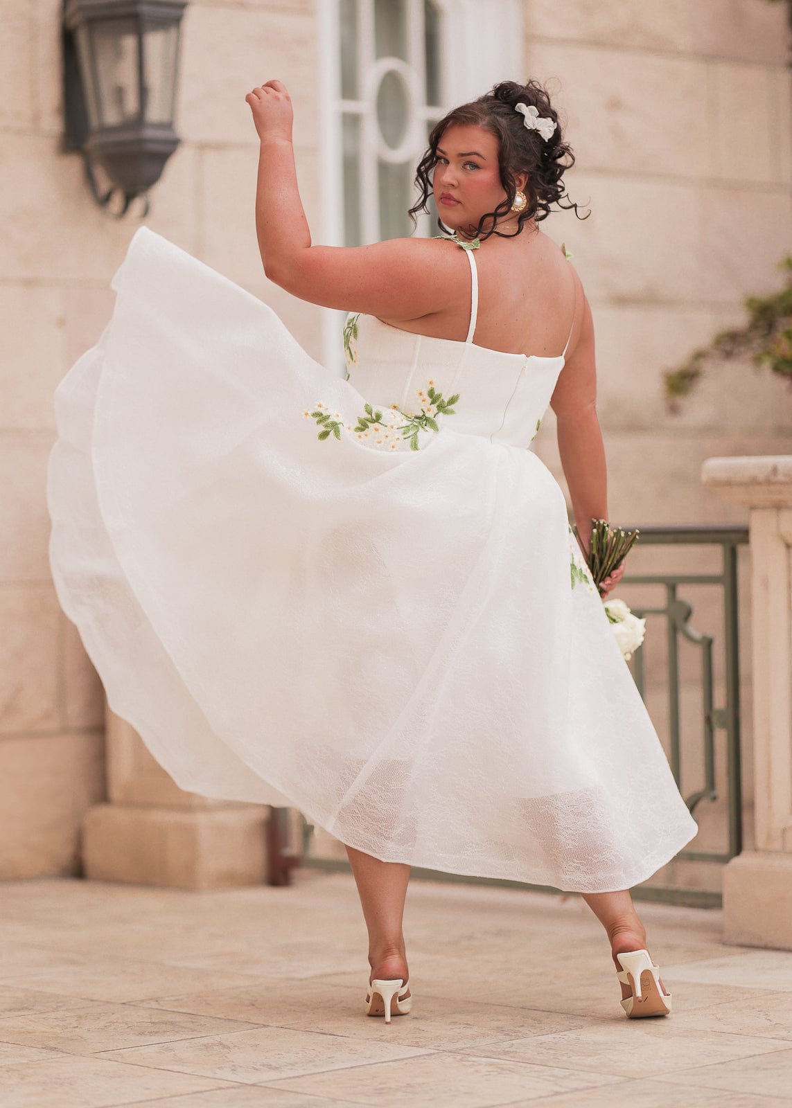 chic size inclusive model wearing JessaKae Lily Petal Dress