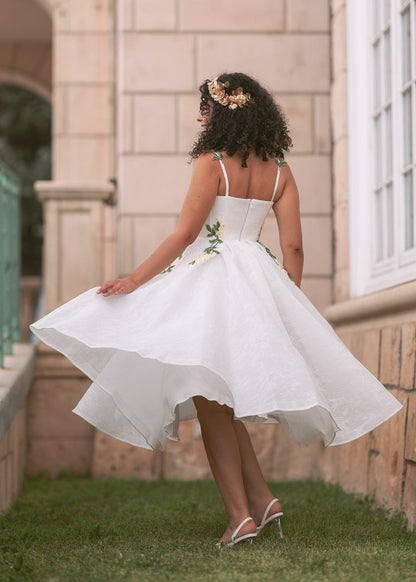 chic size inclusive model wearing JessaKae Lily Petal Dress