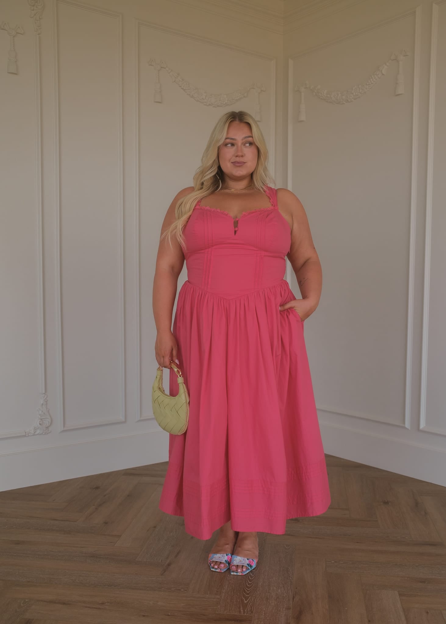 chic size inclusive model wearing JessaKae Lottie Basque Waist Midi Dress - Coral Dresses