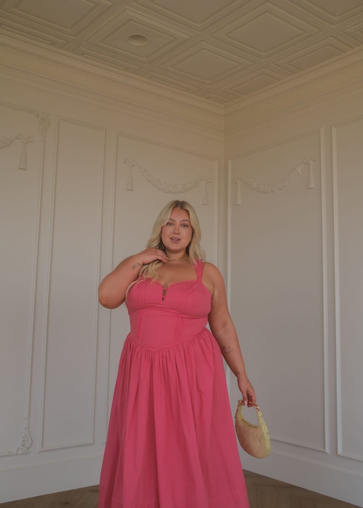 chic size inclusive model wearing JessaKae Lottie Basque Waist Midi Dress - Coral Dresses