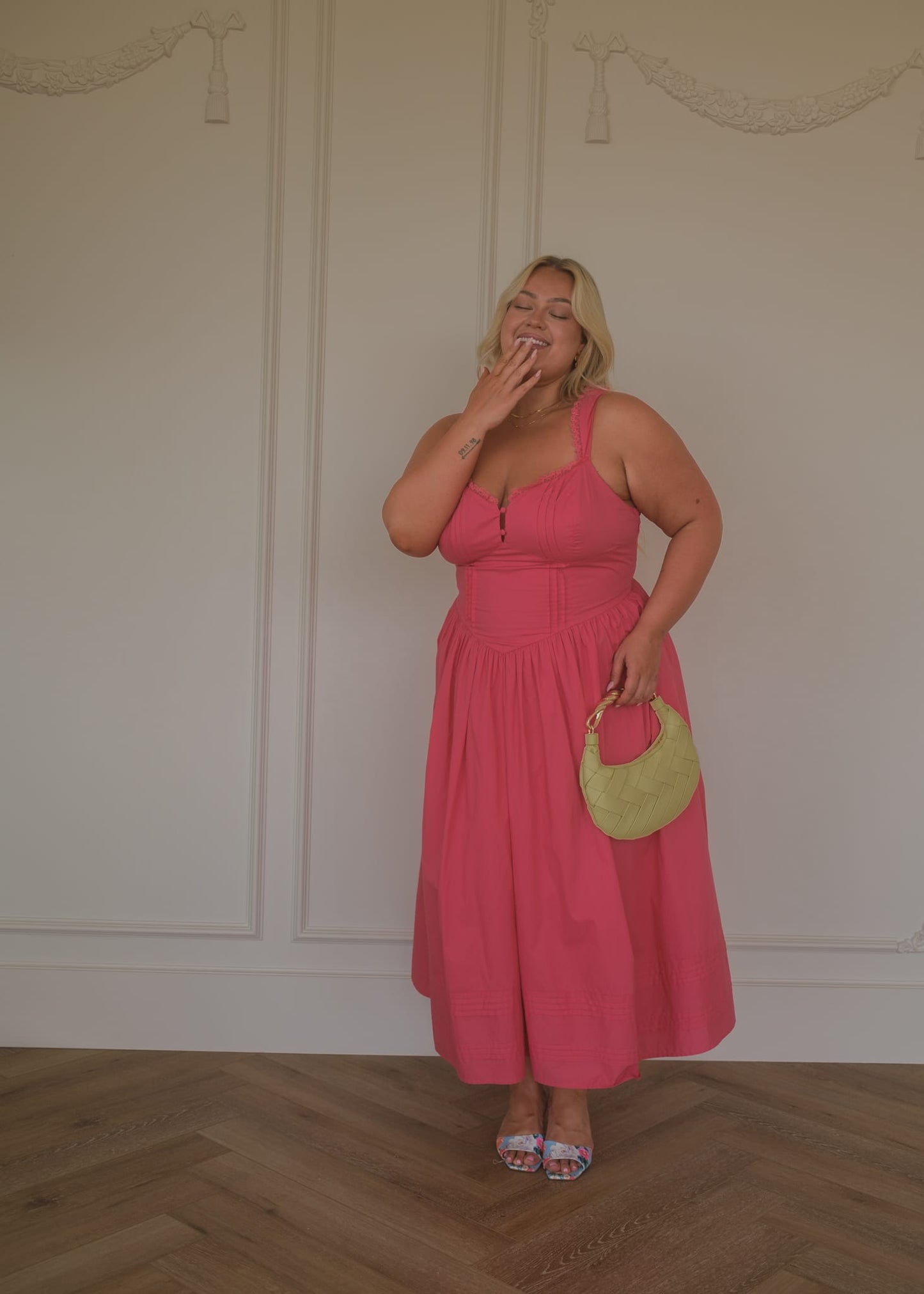 chic size inclusive model wearing JessaKae Lottie Basque Waist Midi Dress - Coral Dresses