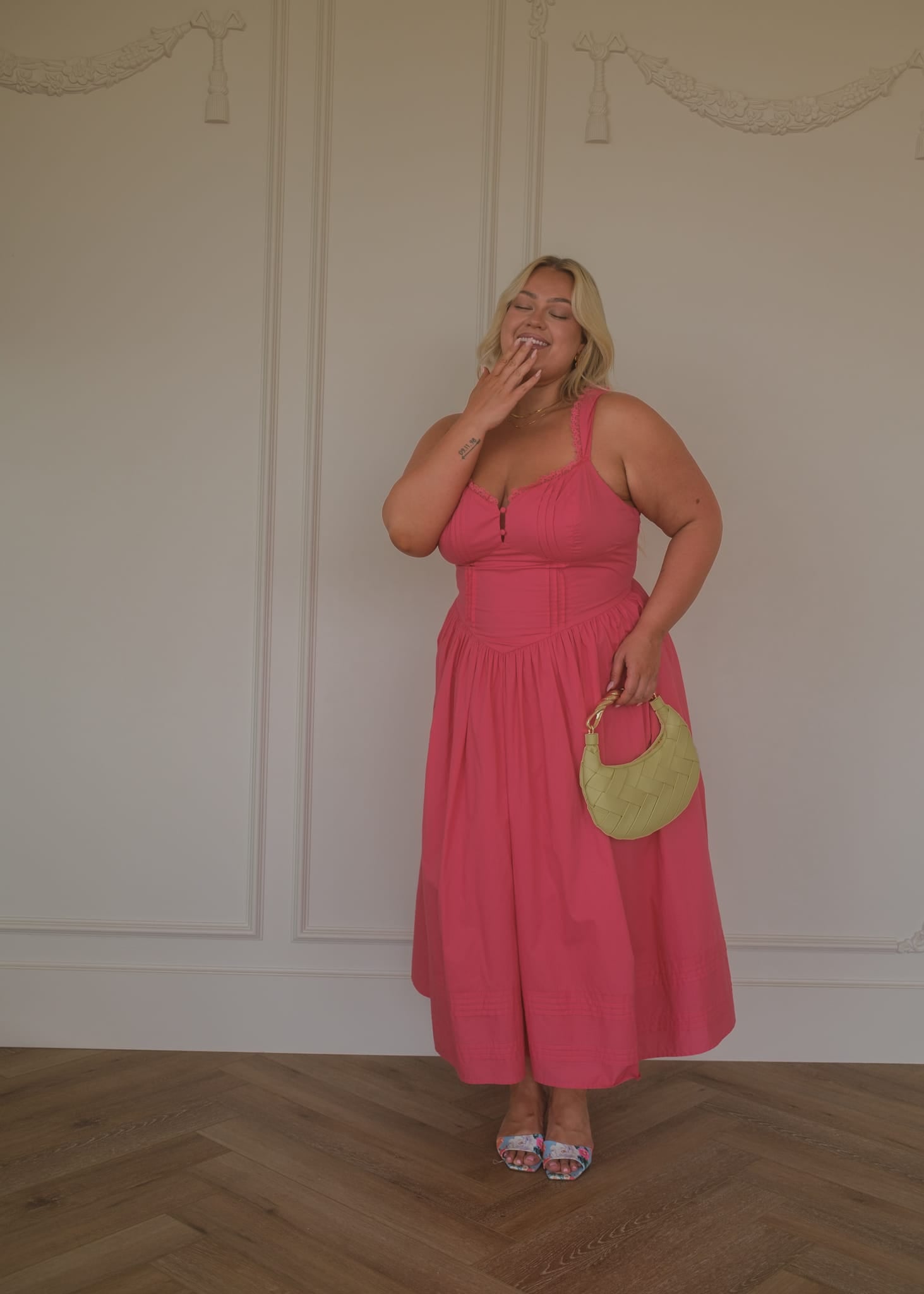 chic size inclusive model wearing JessaKae Lottie Basque Waist Midi Dress - Coral Dresses