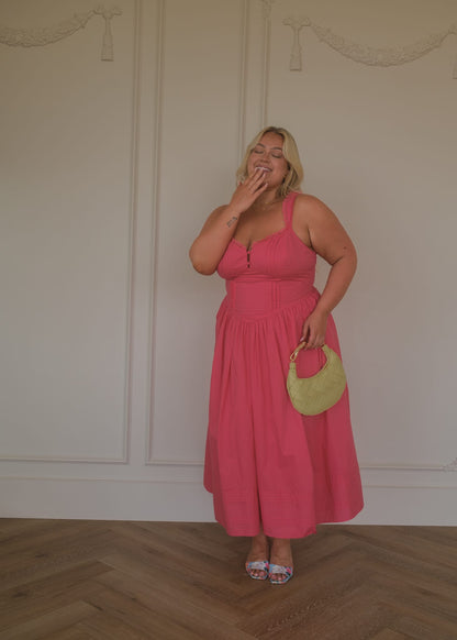 chic size inclusive model wearing JessaKae Lottie Basque Waist Midi Dress - Coral Dresses
