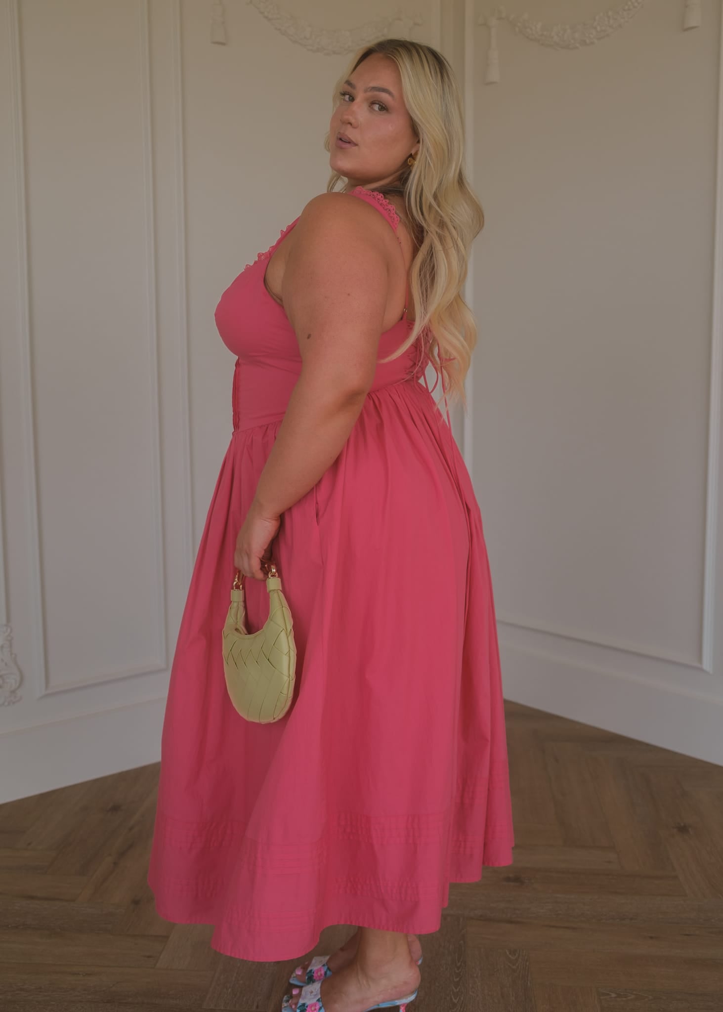 chic size inclusive model wearing JessaKae Lottie Basque Waist Midi Dress - Coral Dresses