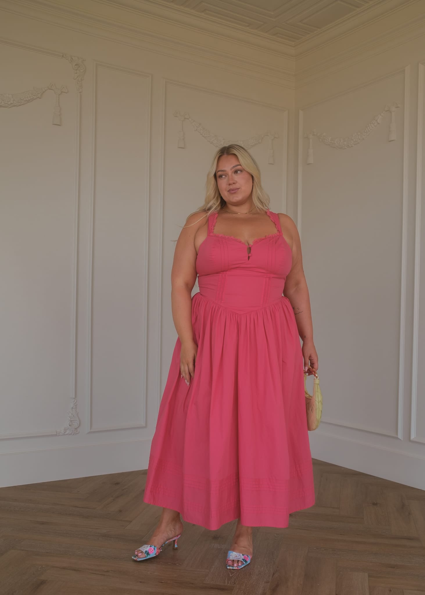 chic size inclusive model wearing JessaKae Lottie Basque Waist Midi Dress - Coral Dresses