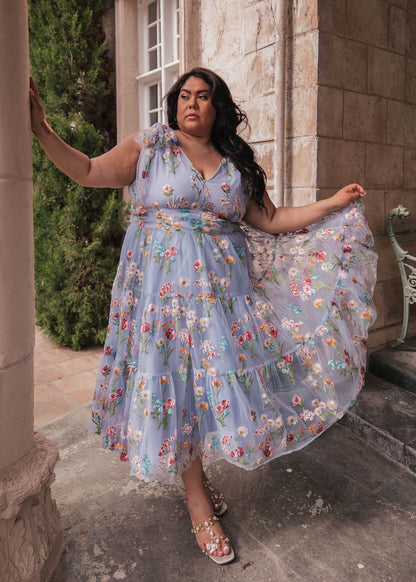 chic size inclusive model wearing JessaKae Margaret Floral Midi Dress Blue Dresses