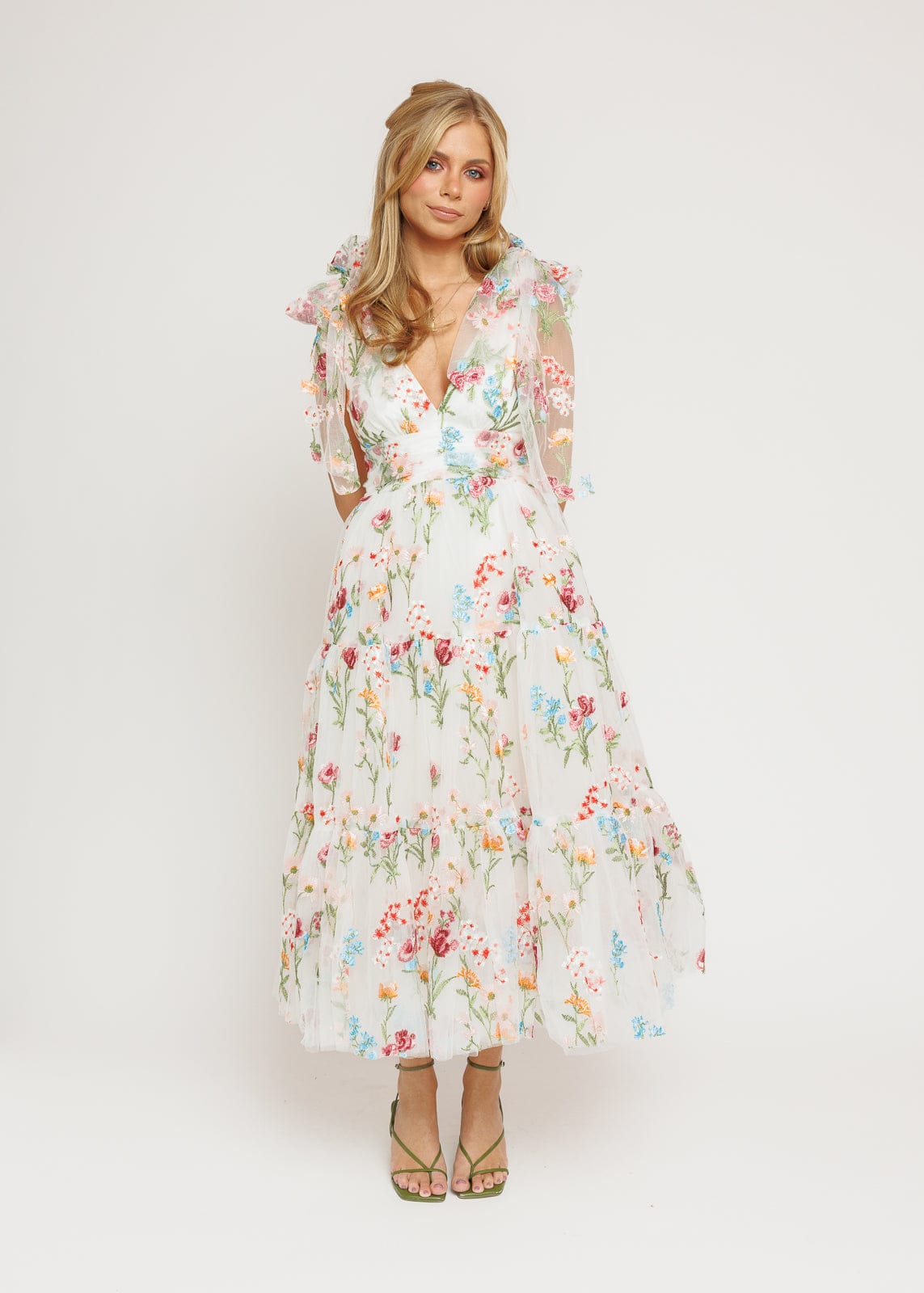 chic size inclusive model wearing JessaKae Margaret Floral Midi Dress White Dresses