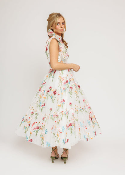 chic size inclusive model wearing JessaKae Margaret Floral Midi Dress White Dresses