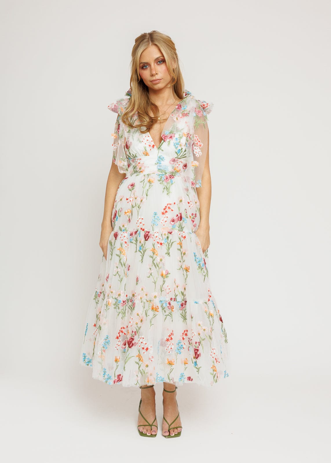 chic size inclusive model wearing JessaKae Margaret Floral Midi Dress White Dresses