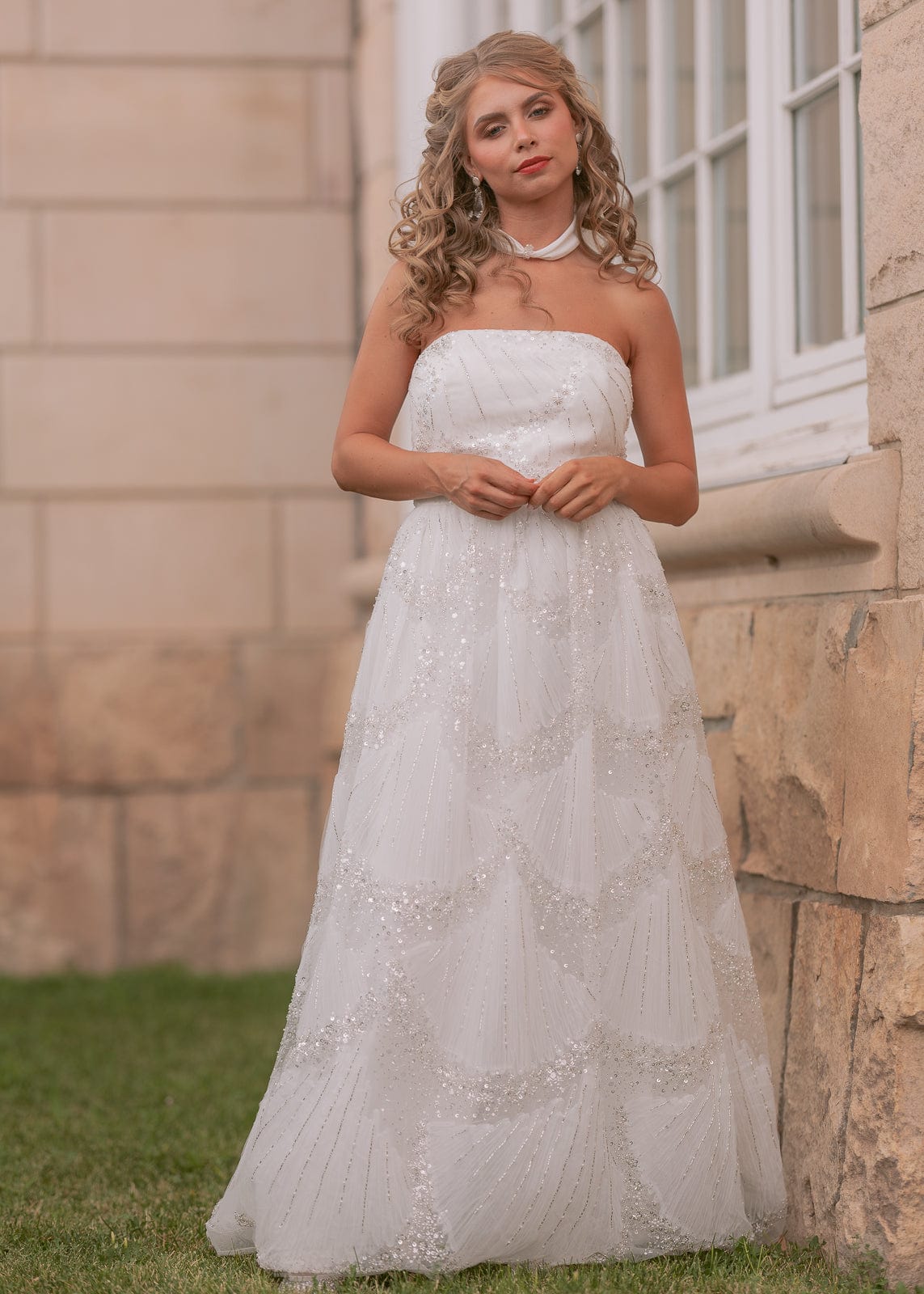 chic size inclusive model wearing JessaKae Pearl Dress