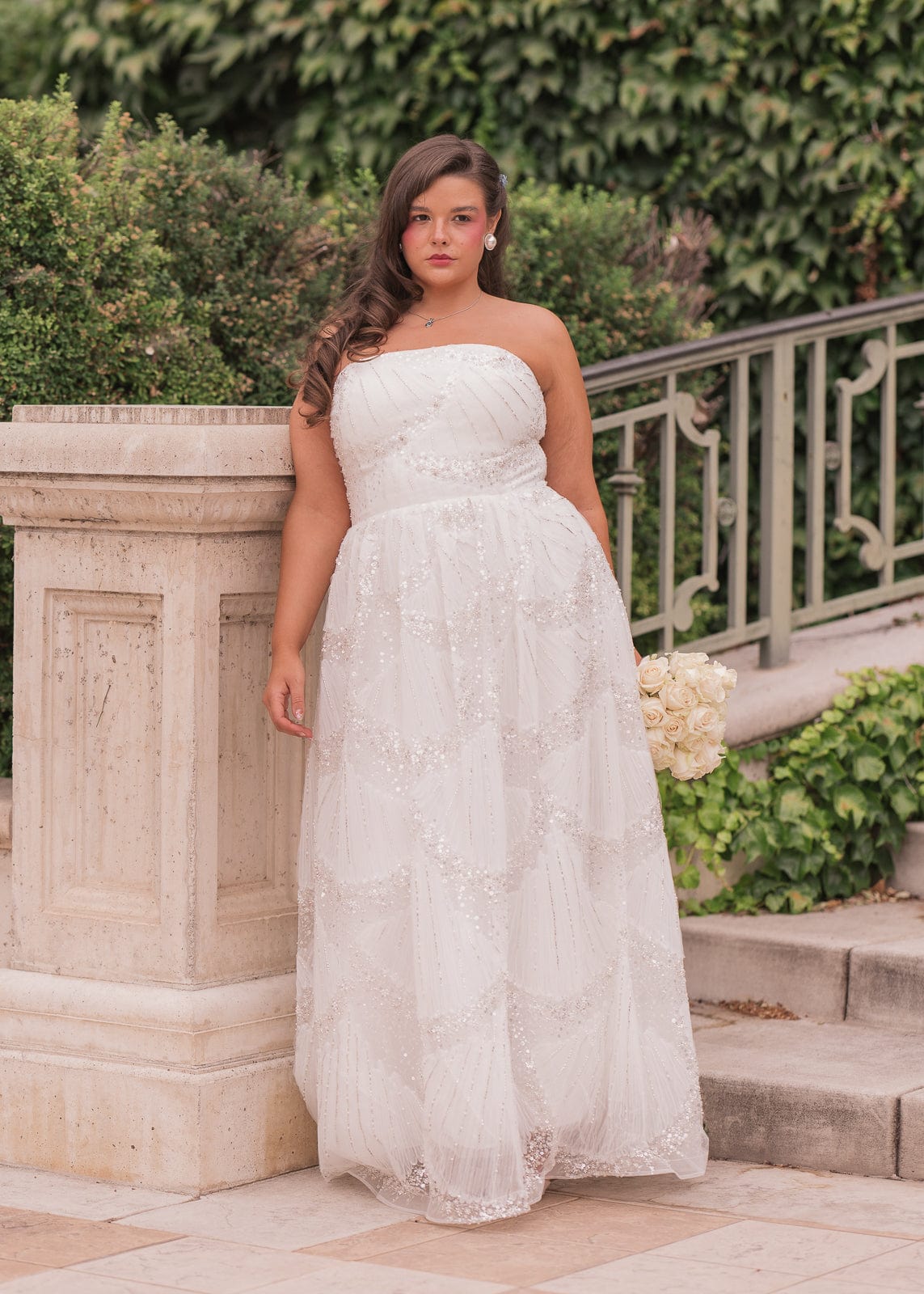 chic size inclusive model wearing JessaKae Pearl Dress