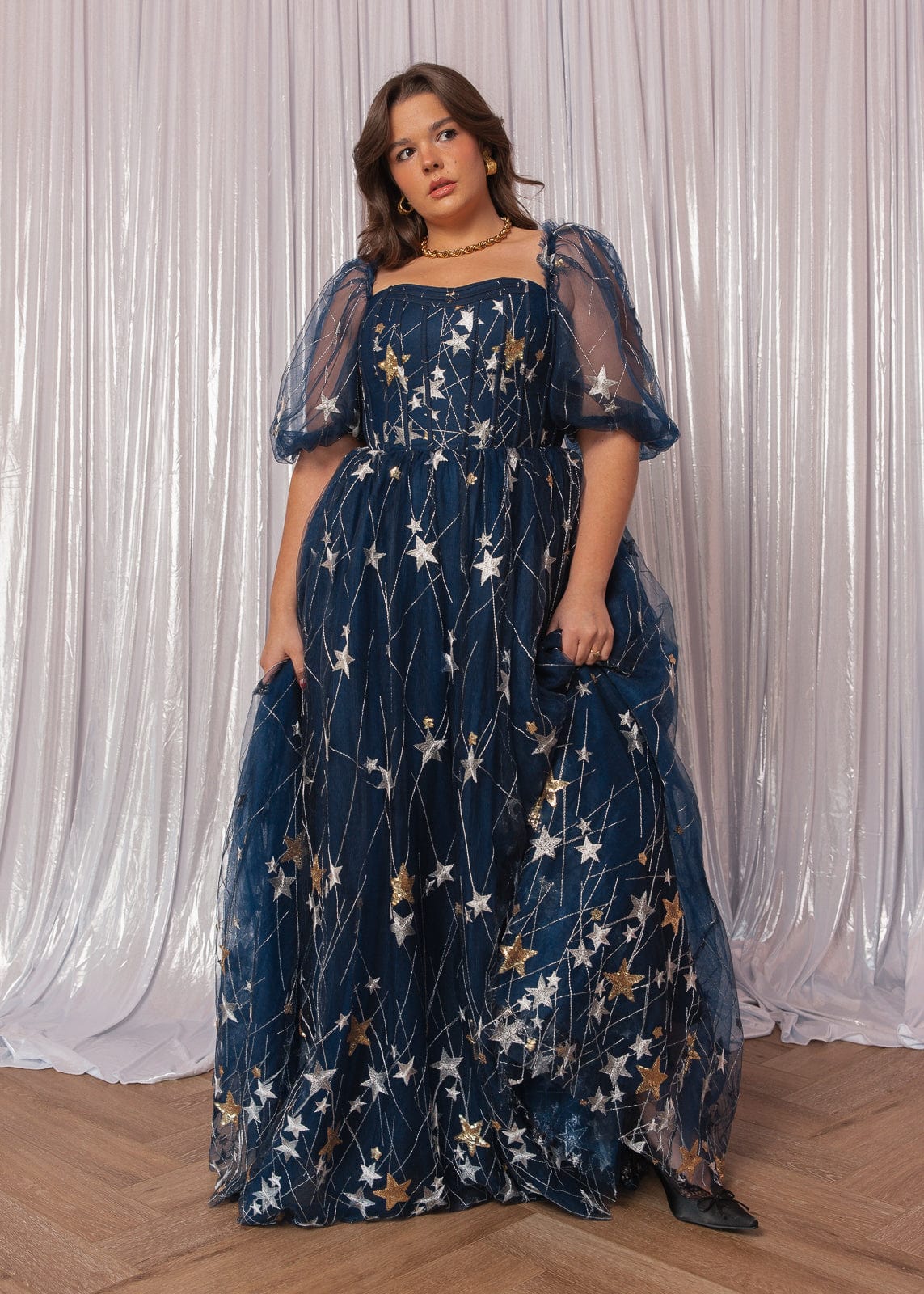 chic size inclusive model wearing JessaKae Starla Dress