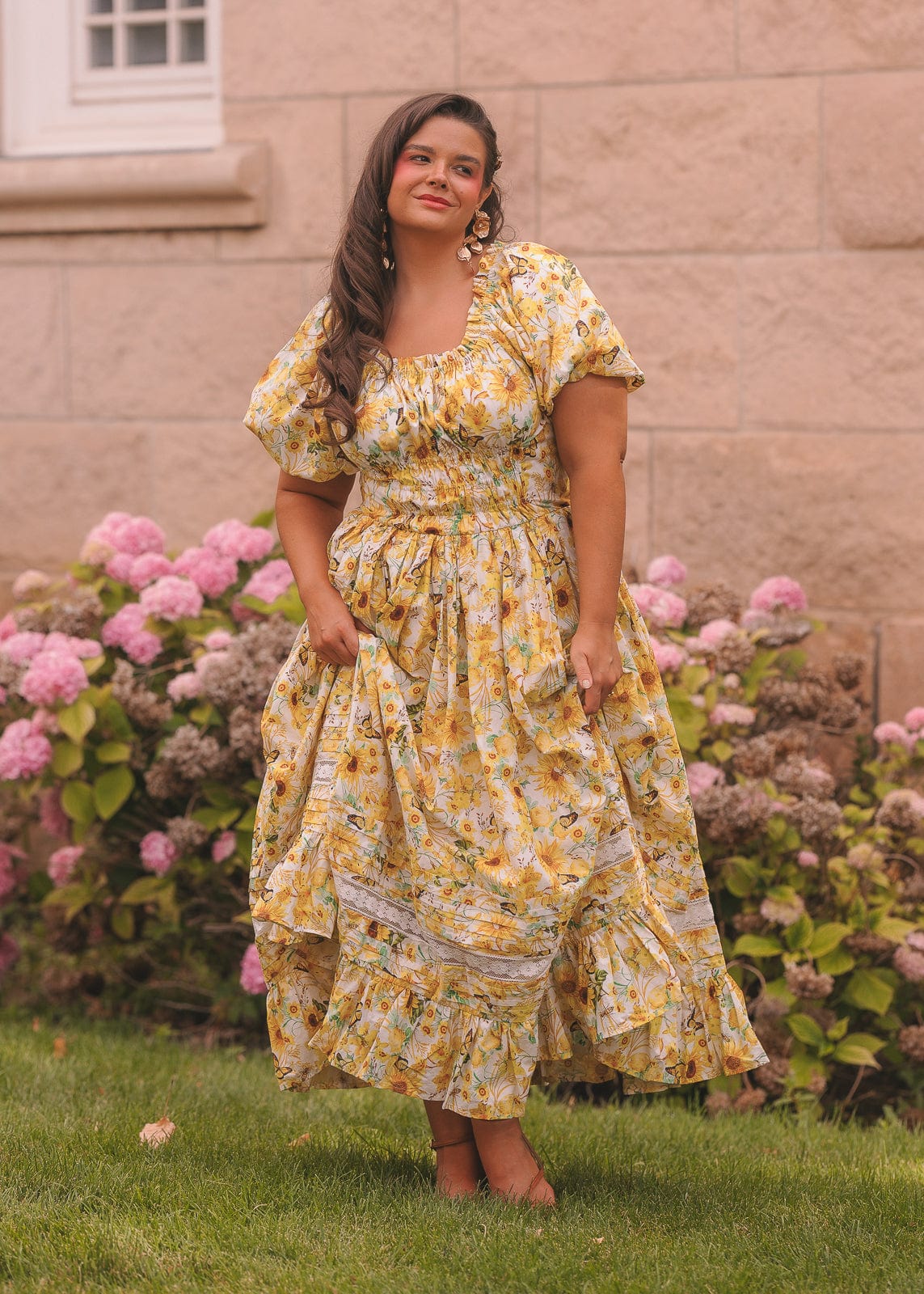 chic size inclusive model wearing JessaKae Sunflowers Dress